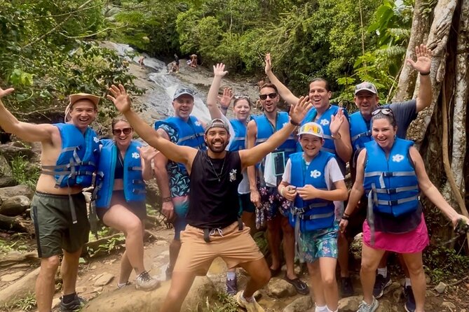 2 Tours in 1 Day: Rainforest Waterslides & Beach Tour w/Transport - Riding through El Yunque National Forest
