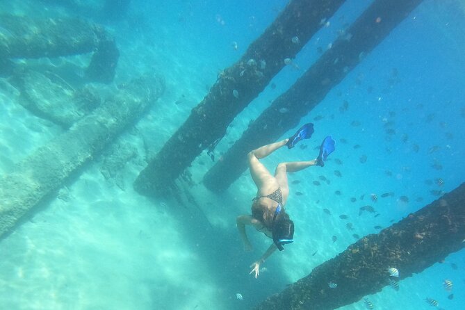 Coral Reef Snorkel Adventure with Photos and Videos - Following the guide across Tres Palmas Marine Reserve