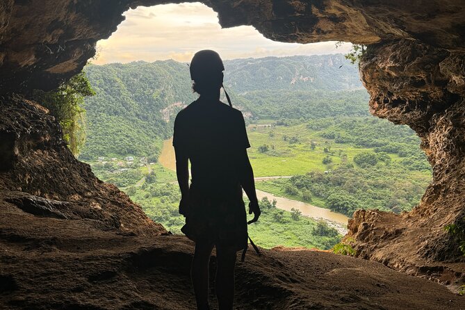 Cueva Ventana and Waterfall Adventure - Walking through the Tanamá River to a waterfall