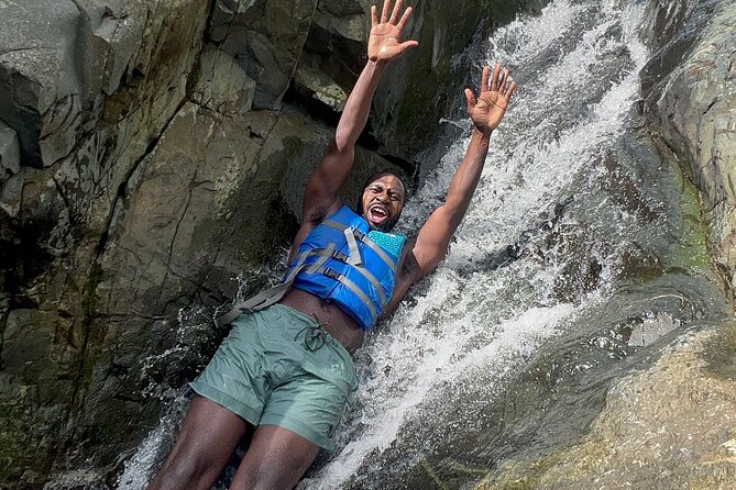 El Yunque Exclusive Experience: Waterslide Adventures w/Transport - Natural waterslides, rope swing, and cliff jumps