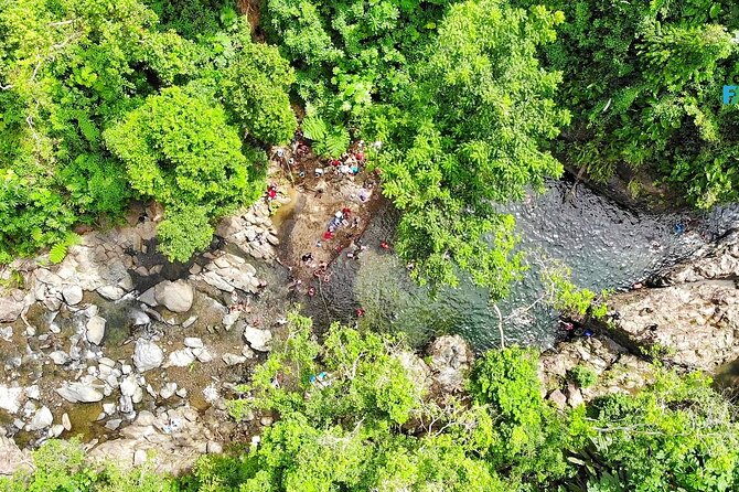 El Yunque National Forest and Luquillo Beach Tour - Puente Roto adds a quieter river setting