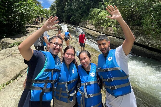 El Yunque Rainforest River and Beach Adventure Tour - The rock waterslide and cliff activities