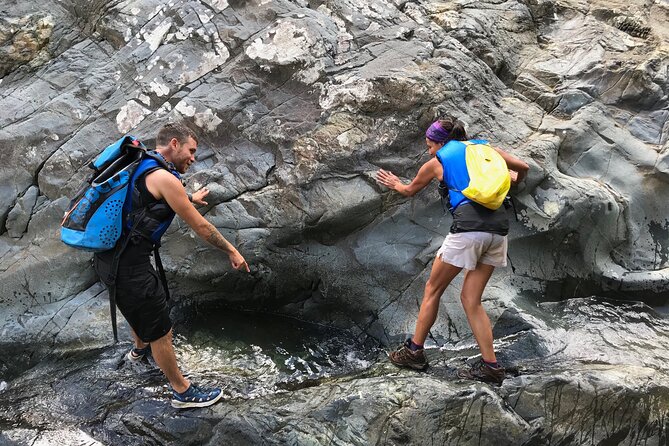 Full-Day Tinajas Hiking to El Yunque Rainforest with Transport - The natural waterslide is the main event