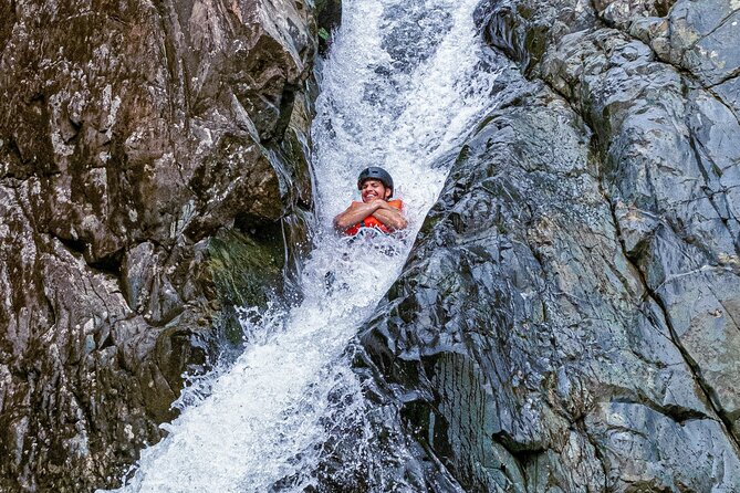 Half Day El Yunque Tour, Waterslide and Rope Swing - First waterfall: rope swing and open-water jumps