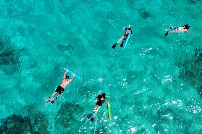 Half-Day Private Boat Experience – Appetizers & Drinks Included - Beach time, drinks, and simple food