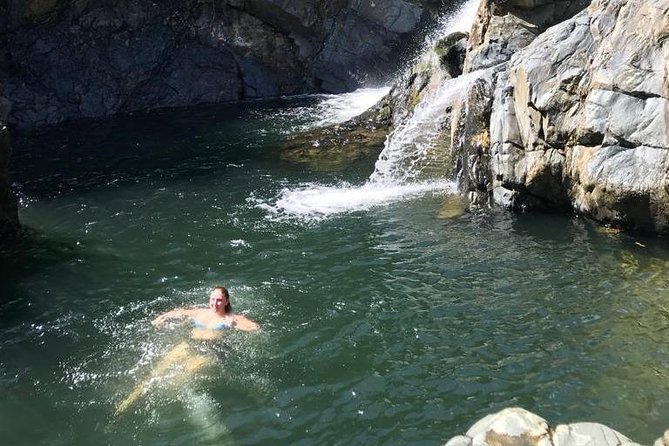 Half-Day Yunque Rainforest Waterslide & rope swing Guided Tour - The second stop: natural rock waterslide and cliff jump