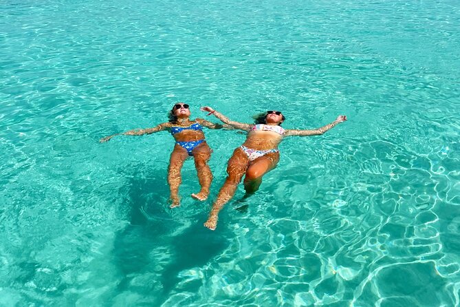 Private All Inclusive East Coast Keys Tour and Snorkel Experience - The first ocean view: San Juan lighthouse from the water