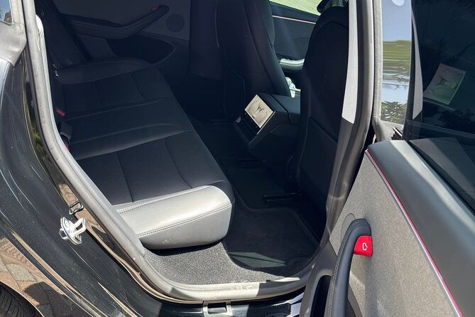 Puerto Rico Island Wide Private Transfers, Tesla 3 Luxury Sedan. - From San Juan Airport to your hotel