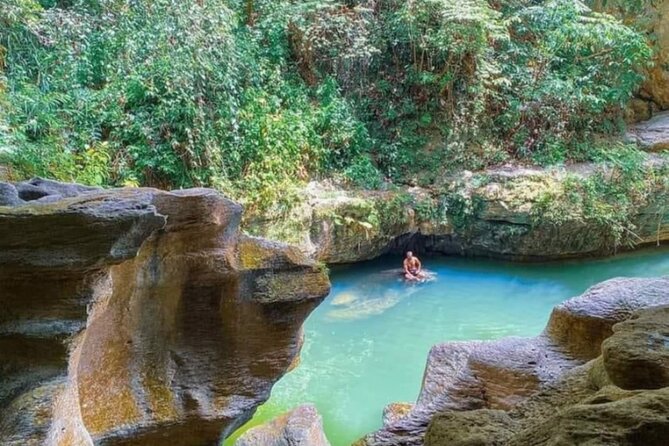 Rainforest Caves and Waterfalls Exploration with Transportation - Swimming at the blue pool