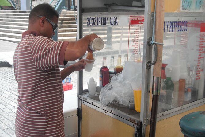 San Juan Highlights Driving Tour - Isla Verde: beach time with a shopping strip nearby
