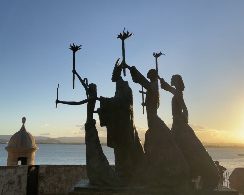 San Juan: Old Town Sunset Walking Tour - Walking toward El Morro at sunset