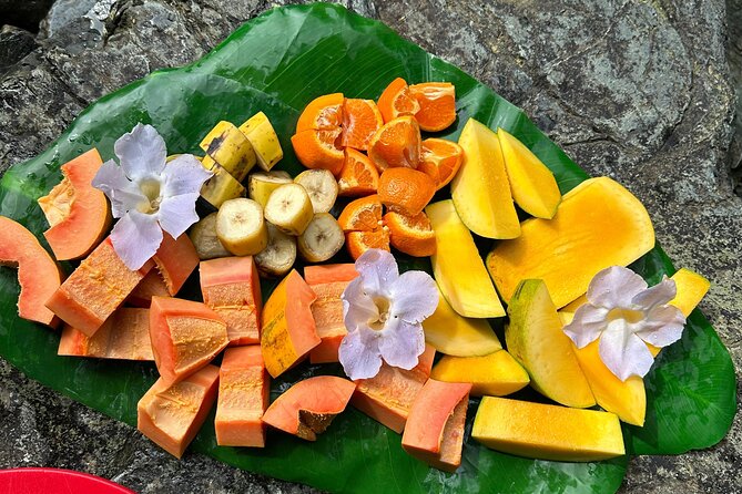 Small-Group El Yunque Rainforest & Transportation Luquillo Beach - Waterfalls, natural slides, and rope swings
