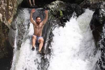 Small-Group El Yunque Waterslide Adventure & transportation