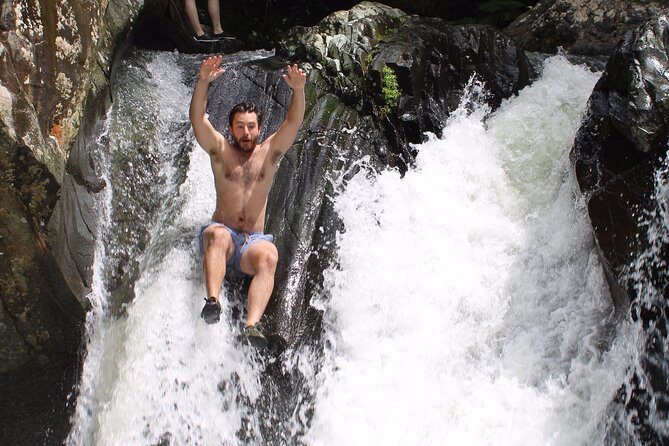 Small-Group El Yunque Waterslide Adventure & transportation - Leaving San Juan in an air-conditioned vehicle